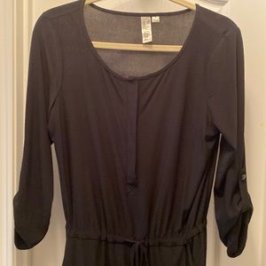 Black jumpsuit with pockets, 59 inches in length from top to bottom.